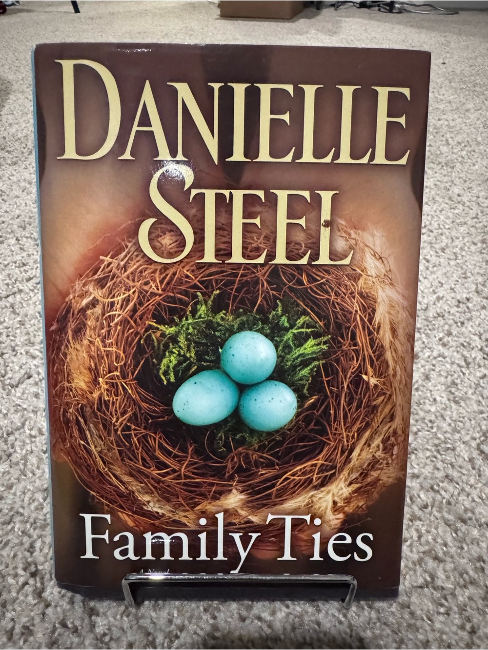 Family Ties - Brown Cover with Turquoise Eggs